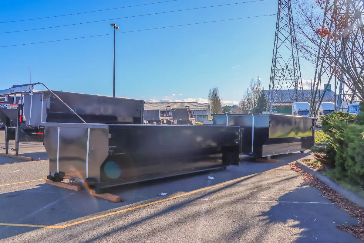 Roll-off dumpster ready for waste disposal at job site for 2 Yard Dumpster Rental in Cave Spring